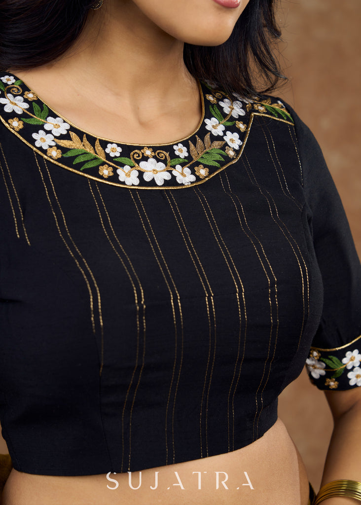 Elegant intrigue : Make a statement with this stunning black cotton silk blouse showcasing a distinctive neckline embroidery.