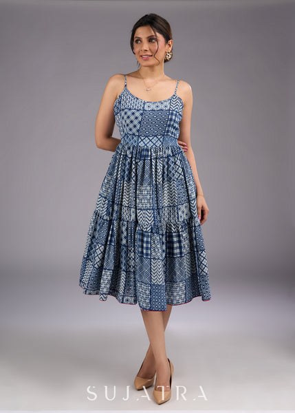 Chic indigo hand-block printed midi dress with delicate straps and a flowy tiered silhouette