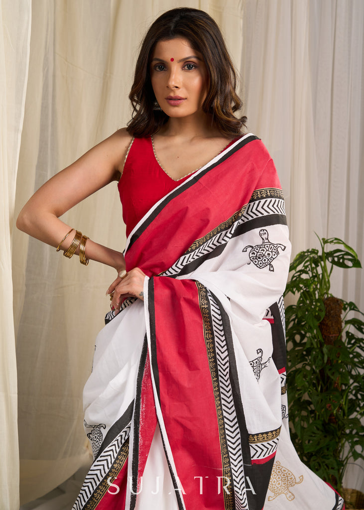 Elegant red & white saree adorned with intricate turtle block prints