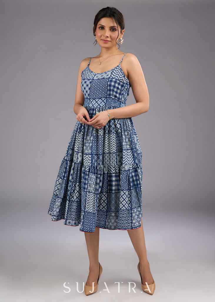 Chic indigo hand-block printed midi dress with delicate straps and a flowy tiered silhouette