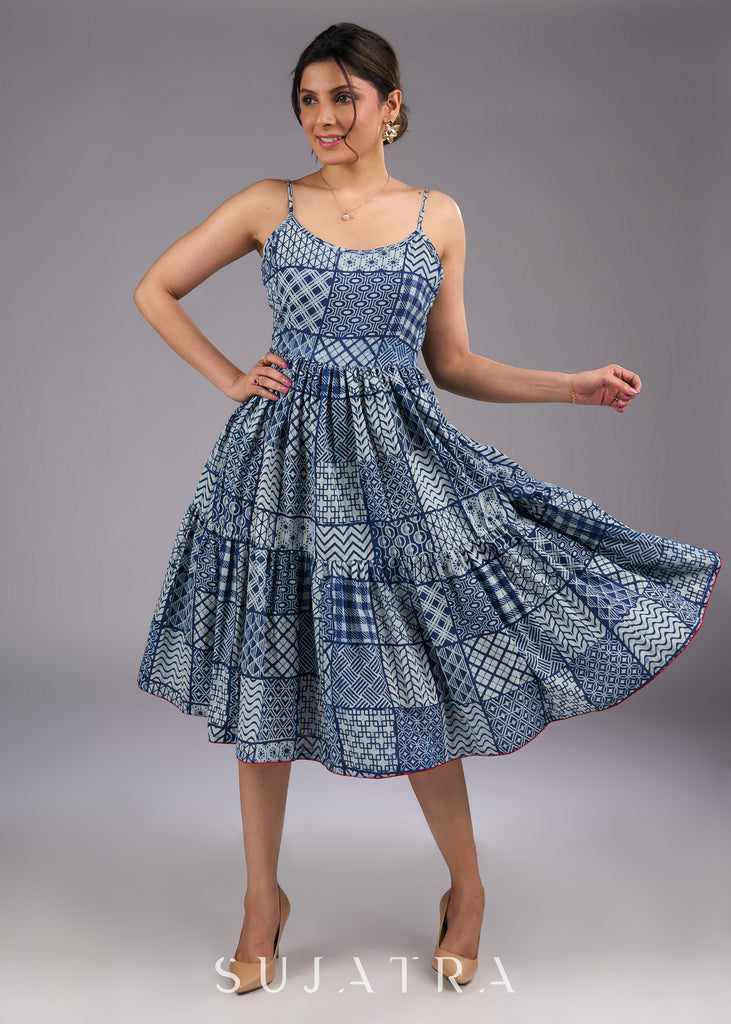 Chic indigo hand-block printed midi dress with delicate straps and a flowy tiered silhouette