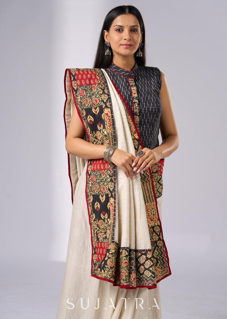 Stylish off white cotton saree with patch work prints & hand painted motifs