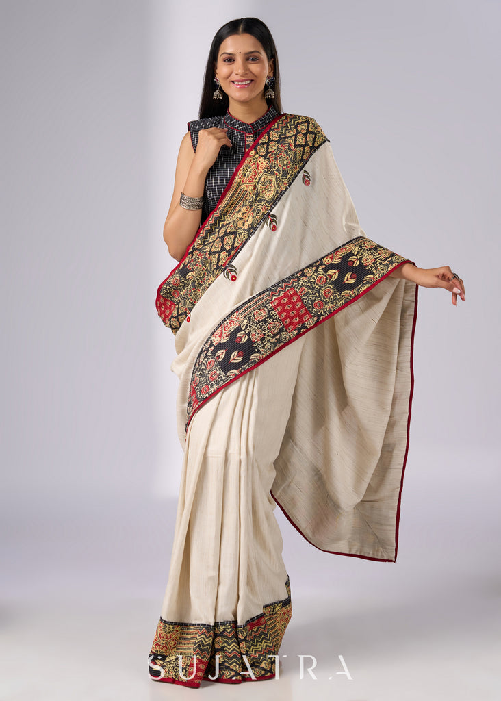 Stylish off white cotton saree with patch work prints & hand painted motifs