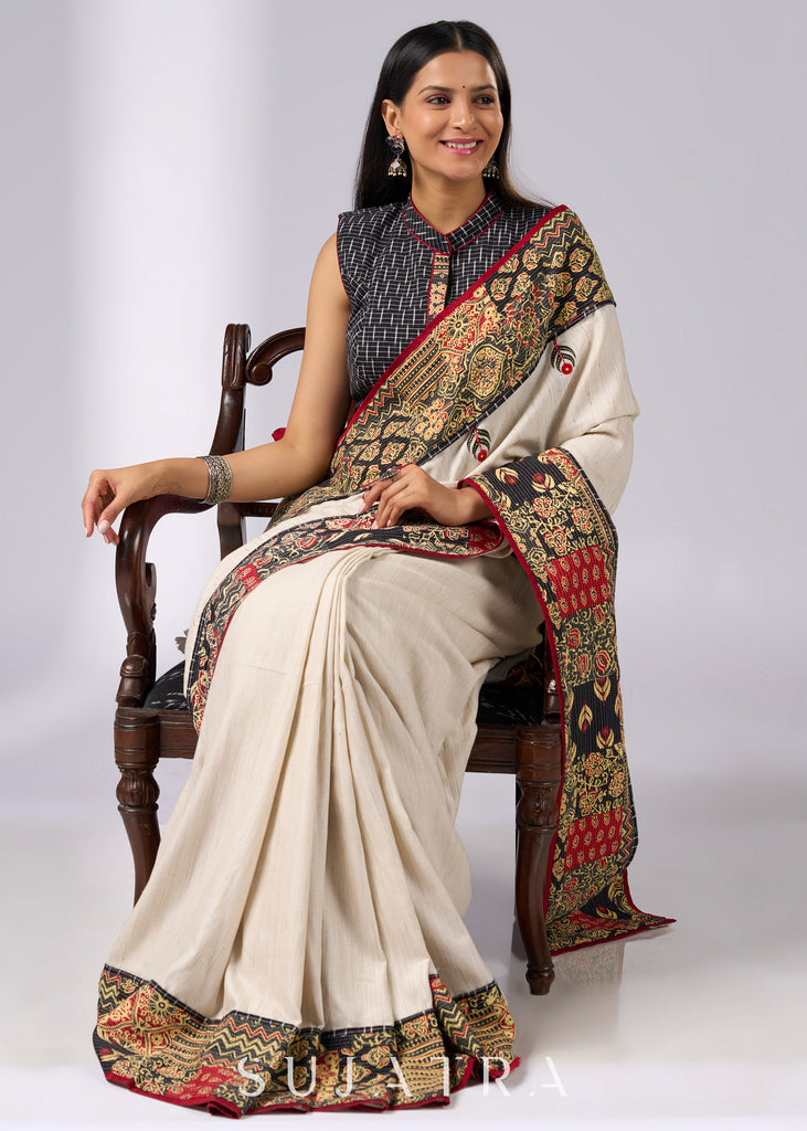 Stylish off white cotton saree with patch work prints & hand painted motifs