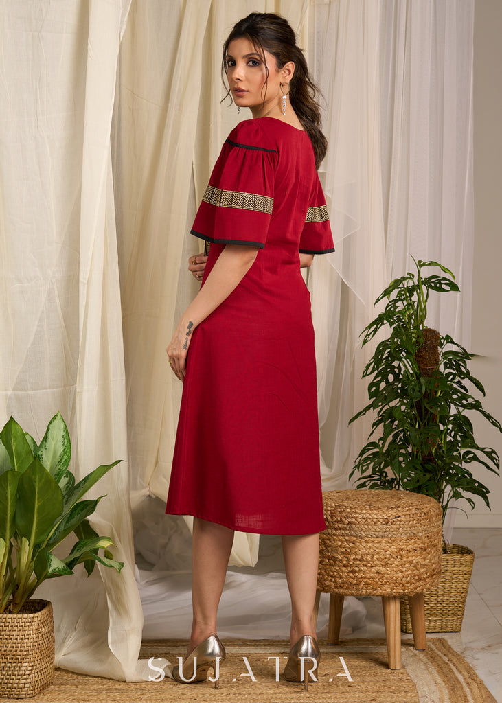 Radiant red cotton dress adorned with bold geometric block printed elegance