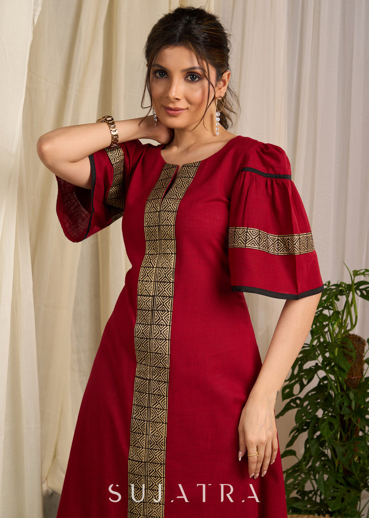 Radiant red cotton dress adorned with bold geometric block printed elegance