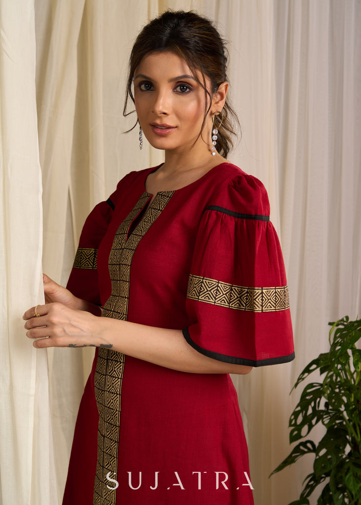 Radiant red cotton dress adorned with bold geometric block printed elegance