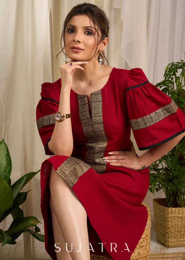 Radiant red cotton dress adorned with bold geometric block printed elegance