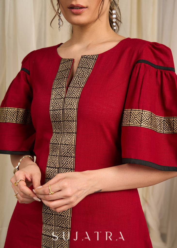 Radiant red cotton dress adorned with bold geometric block printed elegance