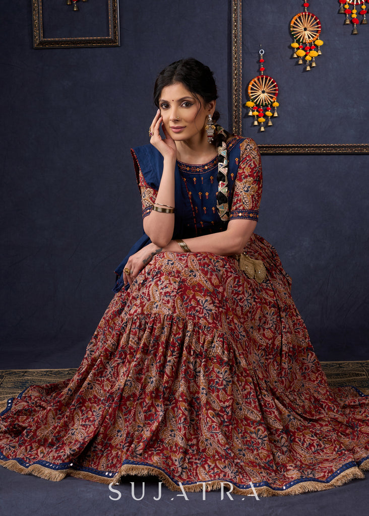 Evergreen Kalamkari Lehenga With Navy Blue Embroidered Blouse & Matching Dupatta.