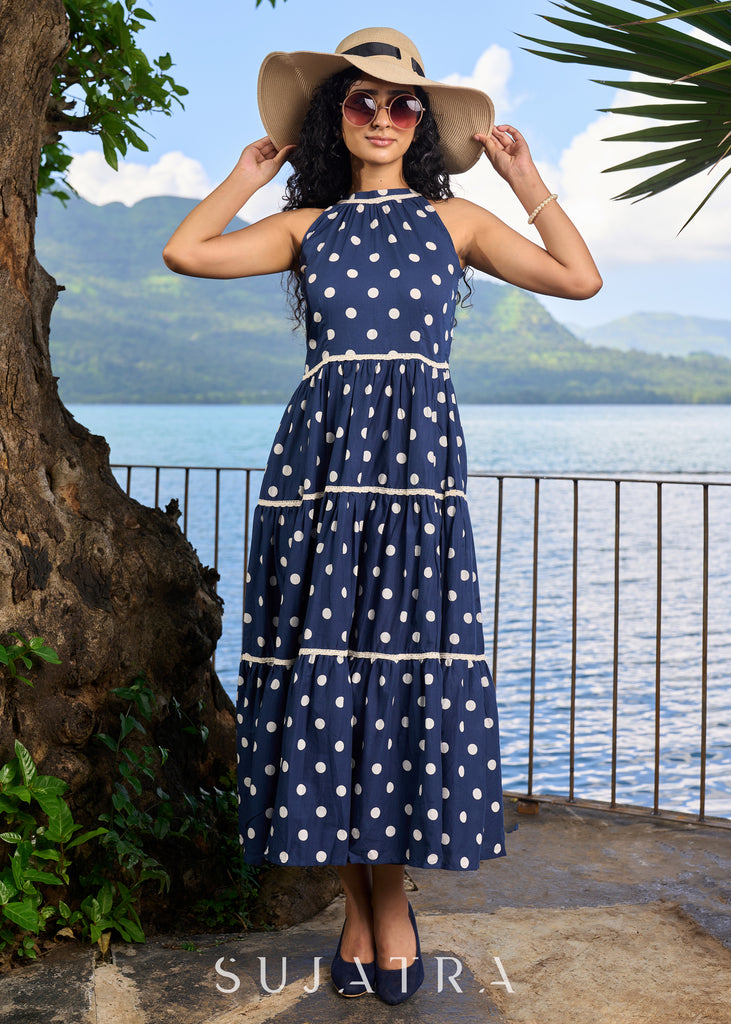 Trendy navy blue cotton polka dot halter neck dress highlighted with macrame lace