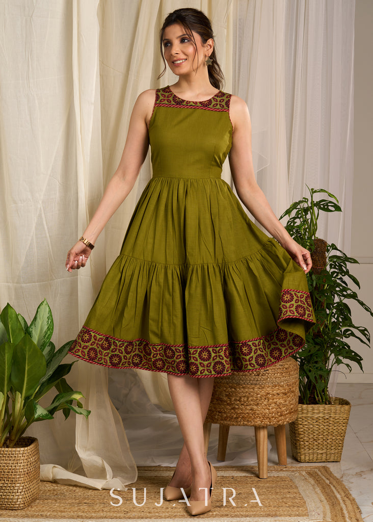 Elegant olive cotton dress featuring intricate block printed border