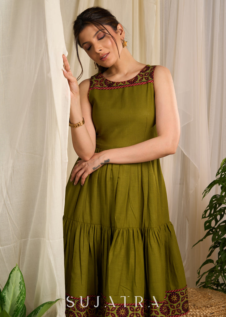 Elegant olive cotton dress featuring intricate block printed border