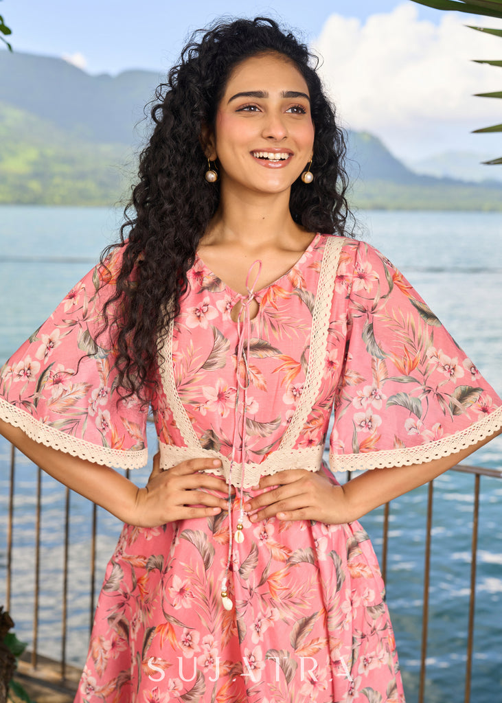 Beautiful light pink chanderi floral printed dress highlighted with macrame lace