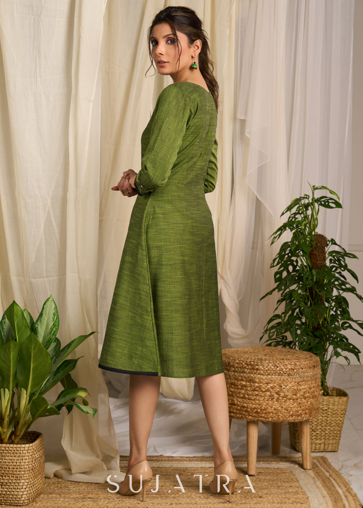 Rich green cotton dress with elegant block print and sequin embellishments