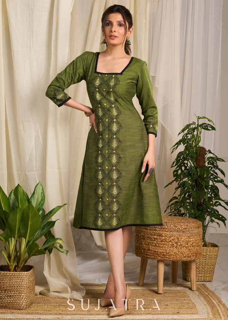 Rich green cotton dress with elegant block print and sequin embellishments