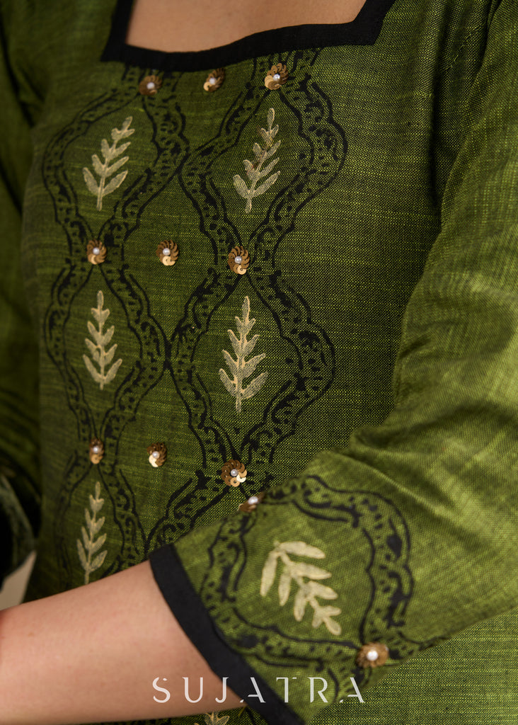 Rich green cotton dress with elegant block print and sequin embellishments