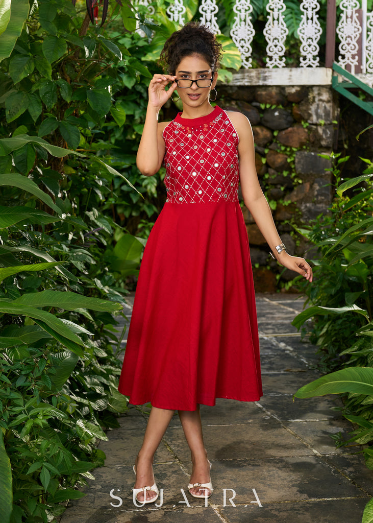 Stylish red cotton halter neck dress highlighted with mirror embroidery on yoke