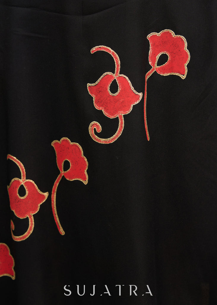 Stunning black rayon dress adorned with vibrant floral block print accents