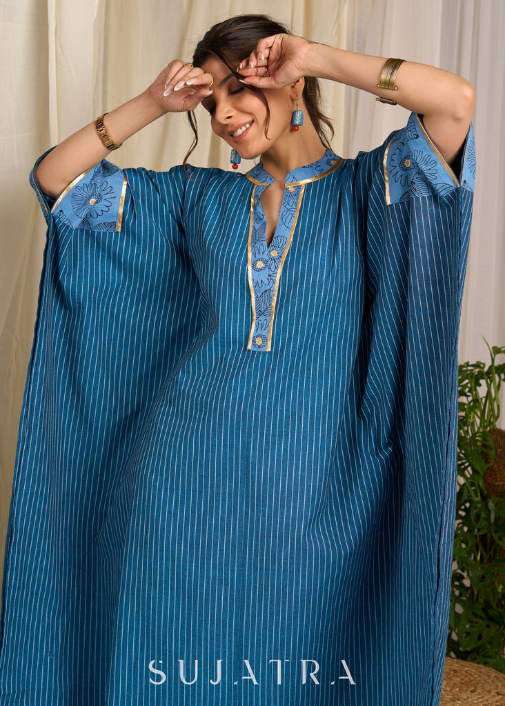 Flowy striped cotton blue kaftan with delicate floral block prints and golden accents