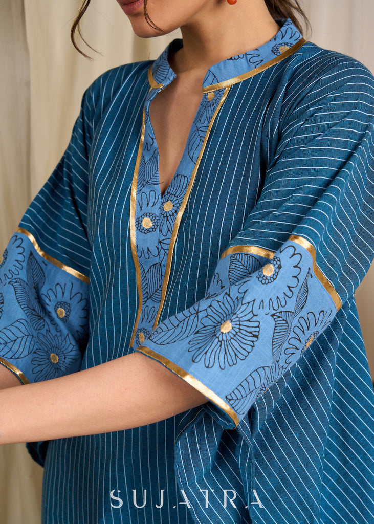 Flowy striped cotton blue kaftan with delicate floral block prints and golden accents