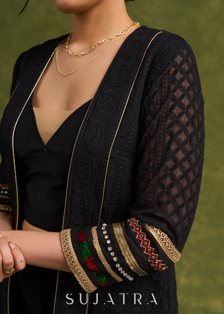 Evening Allure : Black Chikankari Long Shrug With The Sprinkle Of Red & Green Unique Embellishments