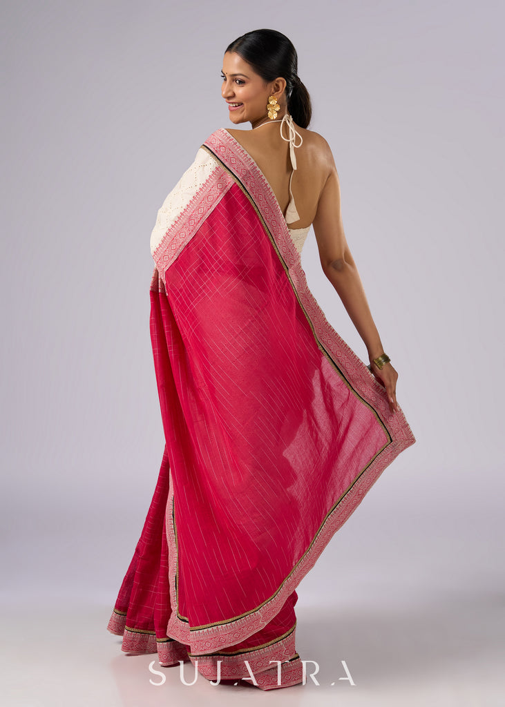 Festive off white haakoba cotton saree with bright chequered pink combination