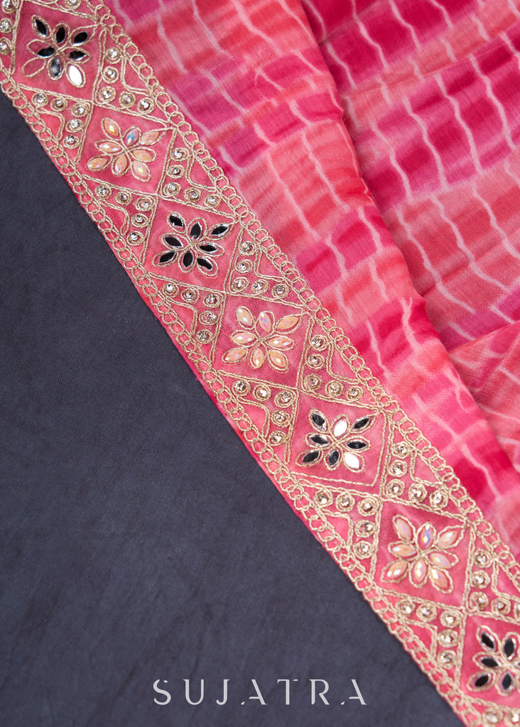 Pretty Pink Shibori Lehenga With Stone Embellishments On The Blouse & Matching Dupatta.