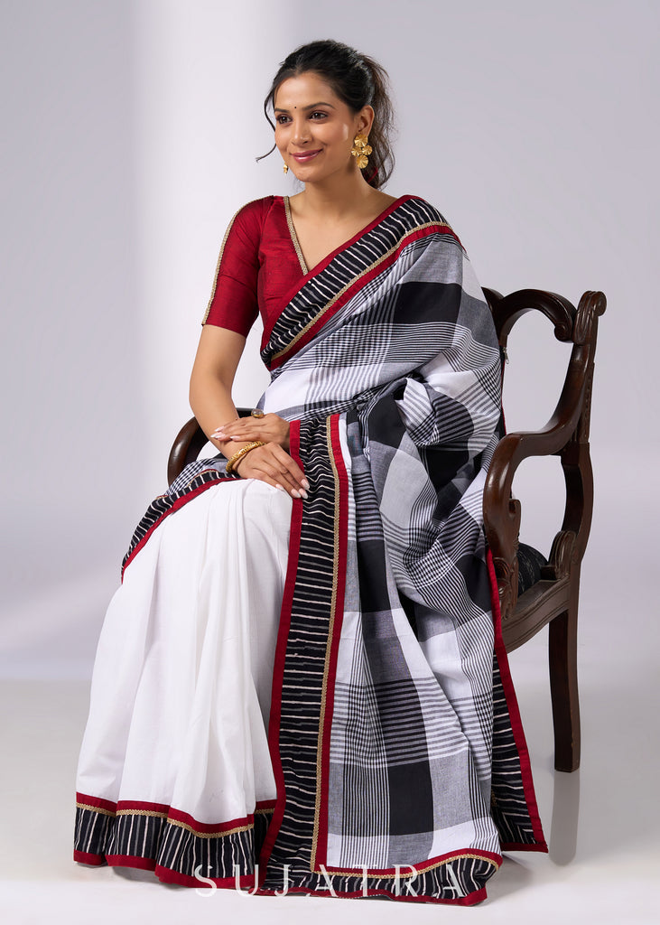 Classy white cotton saree with bold checks & red-black borders