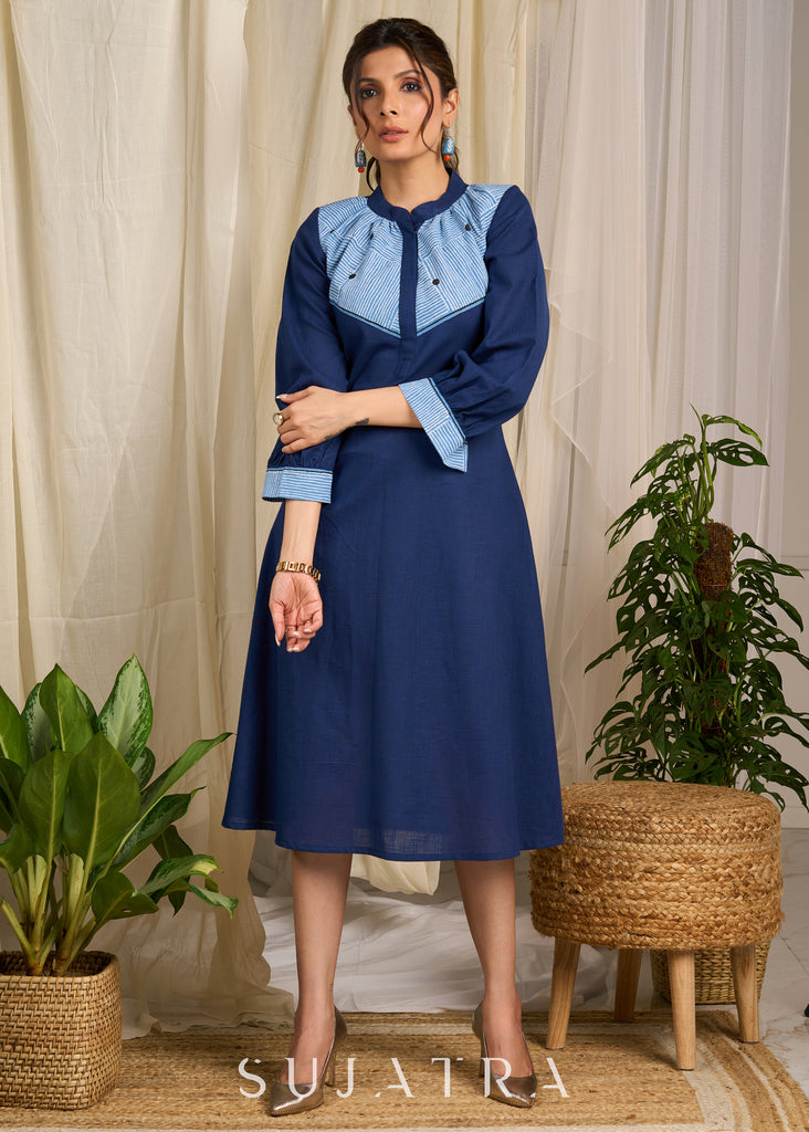 Elegant navy cotton dress with contrasting block printed yoke and cuffs