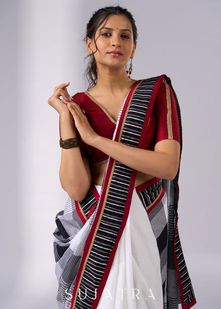 Classy white cotton saree with bold checks & red-black borders