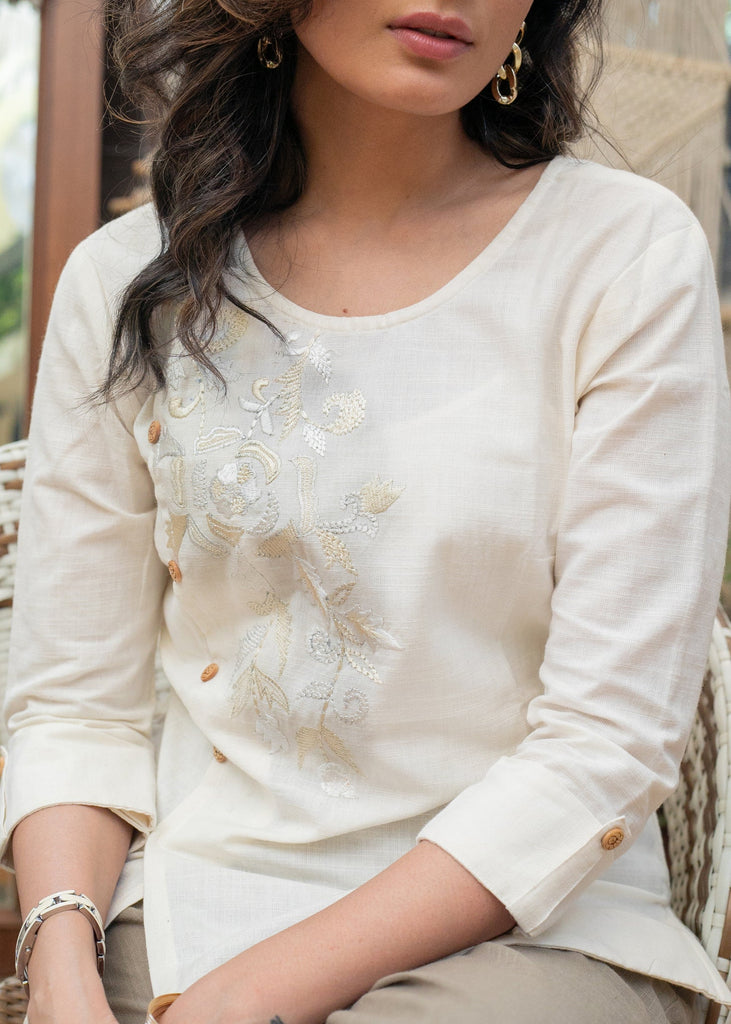 ON-SALE-elegant-white-cotton-top-with-beautiful-embroidery-on-one-side-highlighted-with-golden-buttons