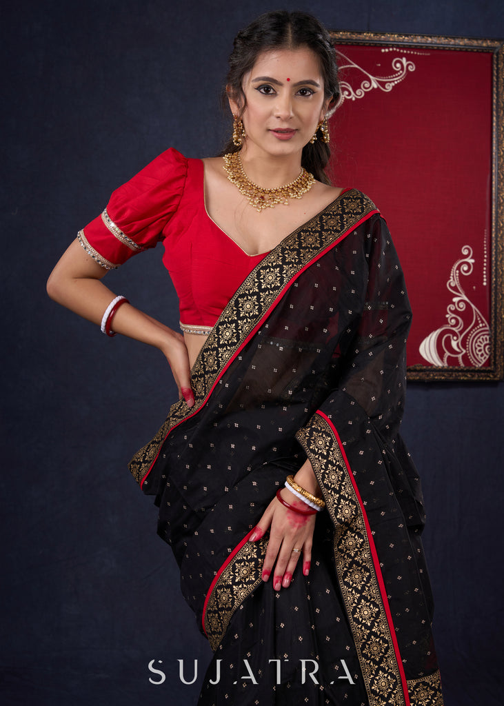 Classy Black Chanderi saree with overall Gold Butta, Golden border & Red Detailing