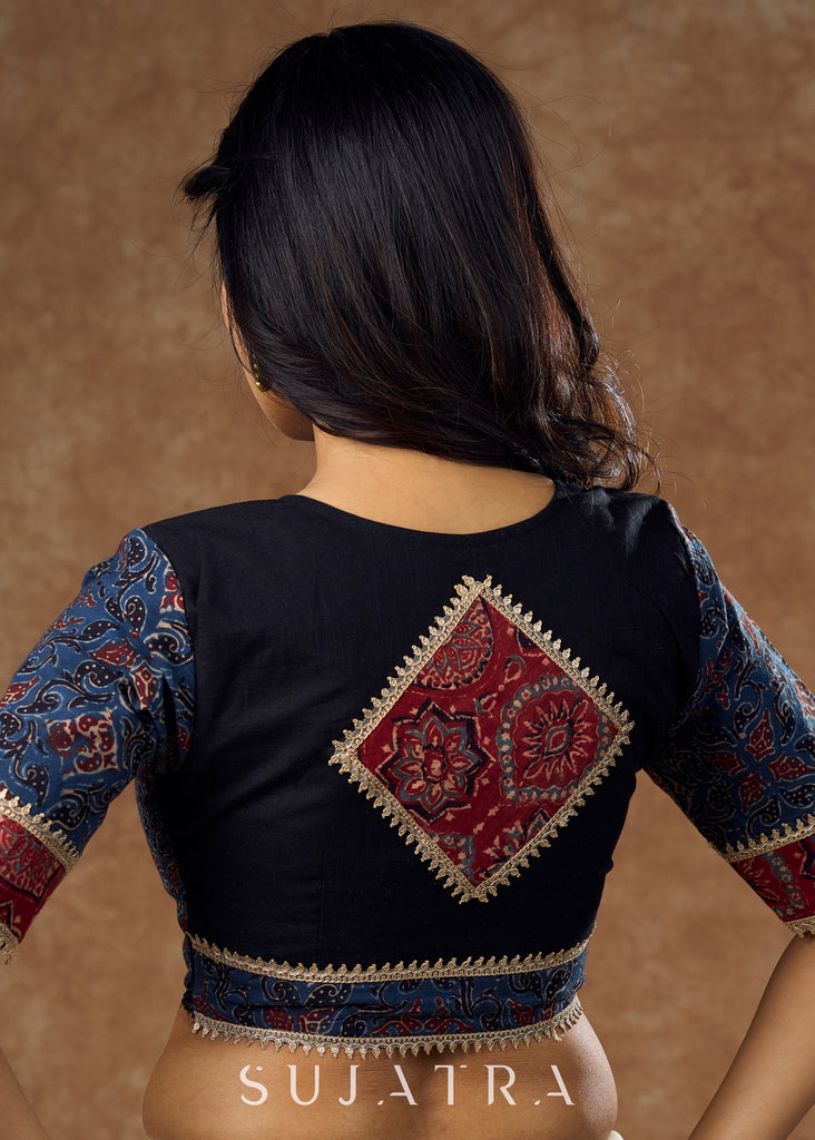 Evergreen maroon & blue Ajrakh blouse with lace work .