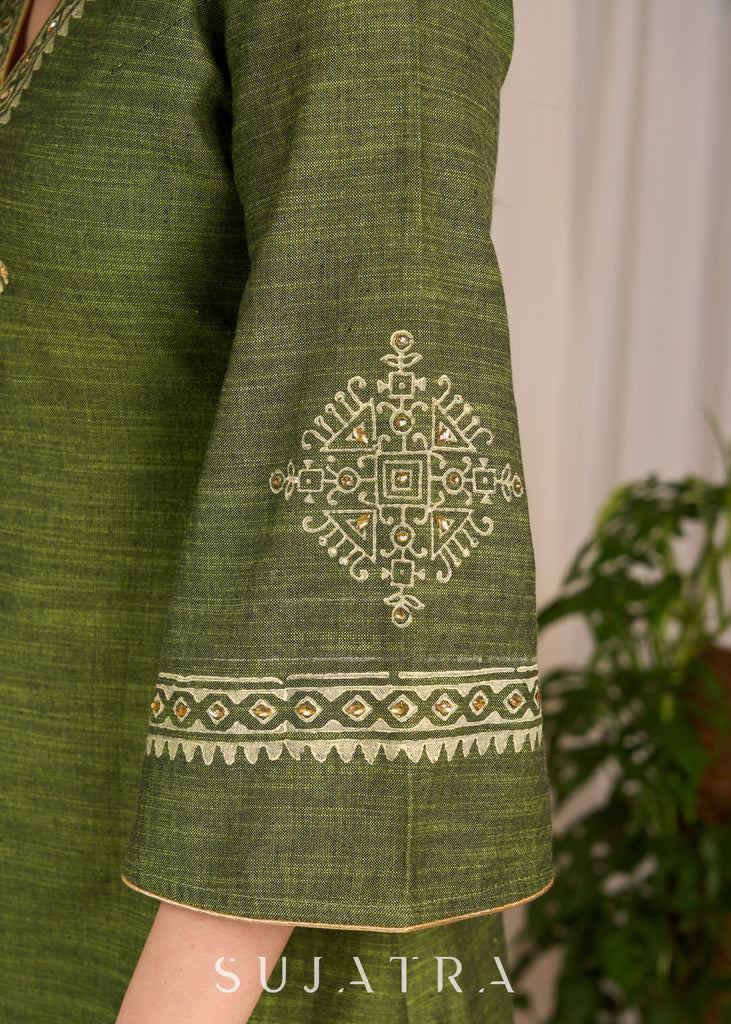 Graceful green cotton dress showcasing exquisite block print and artistic handcrafted detailing