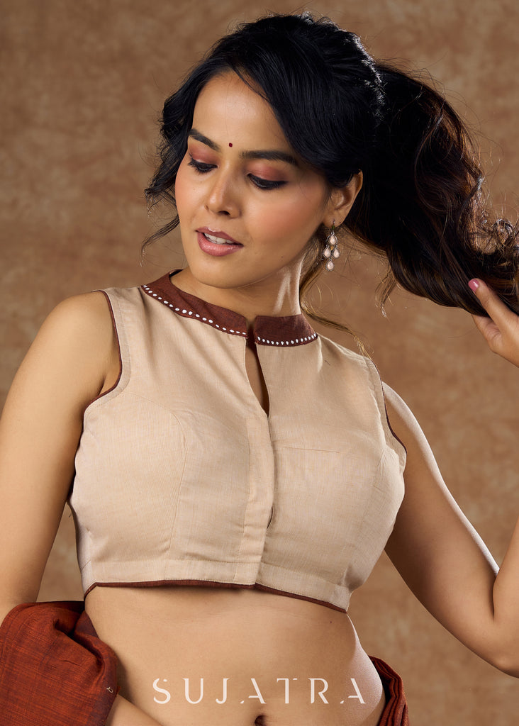 Elegant handloom cotton blouse featuring intricate hand-painted artwork and subtle brown detailing