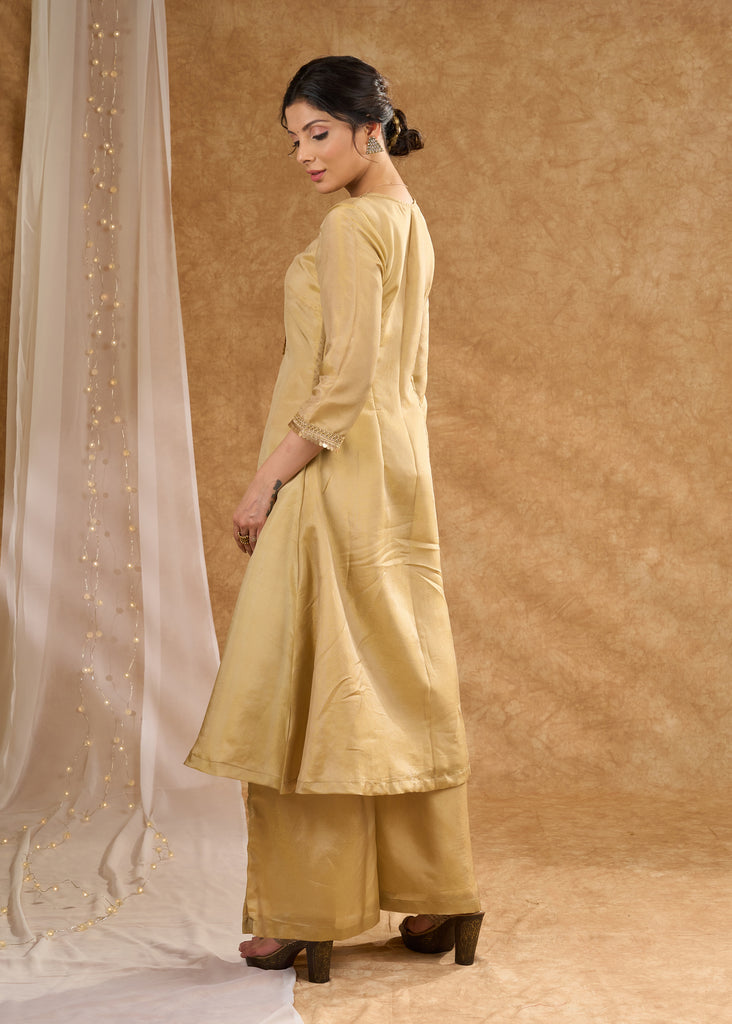 Subtle golden tissue A line kurta with tissue pant Dupatta optional