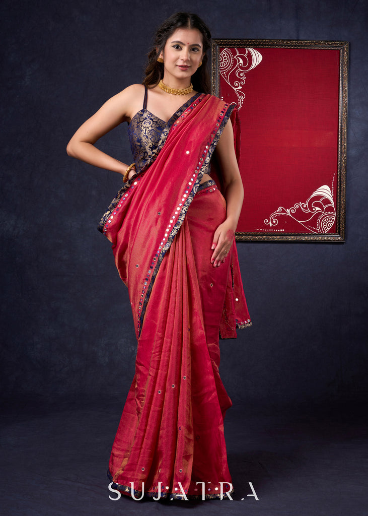 Mesmerizing Tissue Saree with all-over mirror work detailing highlighted with Banarasi Border