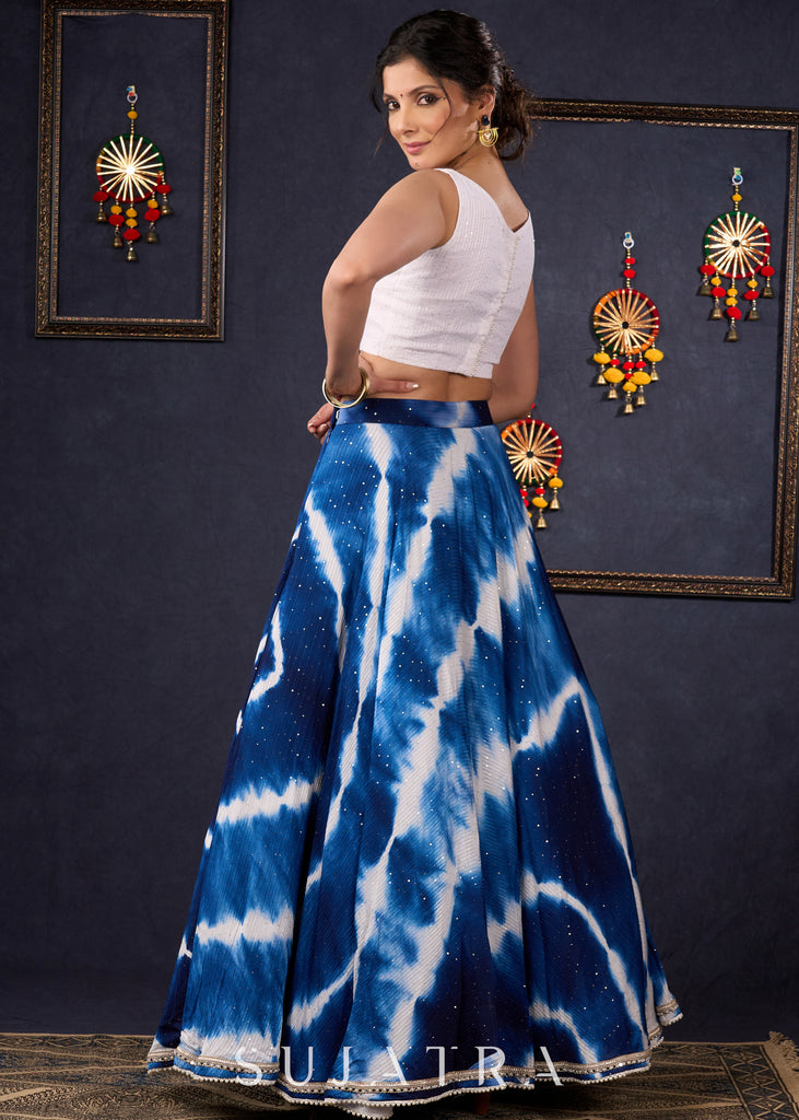 Graceful Navy Blue Shibori Self-Embroidered Lehenga With Contrast Blouse & Matching Dupatta.