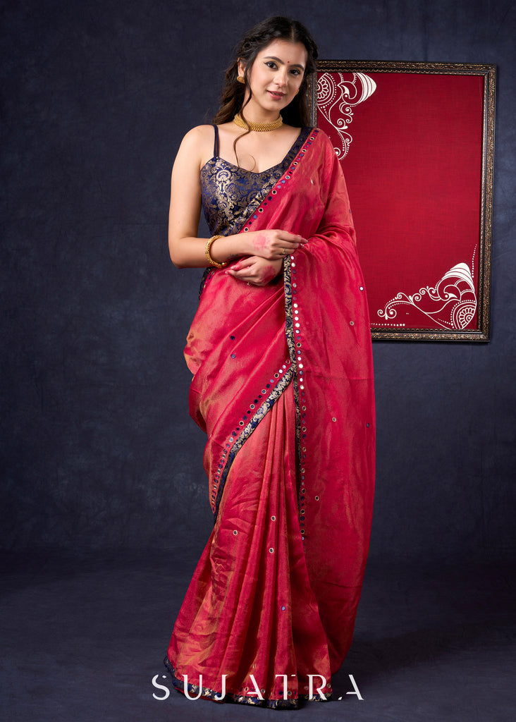 Mesmerizing Tissue Saree with all-over mirror work detailing highlighted with Banarasi Border