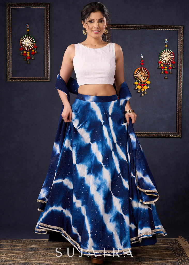 Graceful Navy Blue Shibori Self-Embroidered Lehenga With Contrast Blouse & Matching Dupatta.