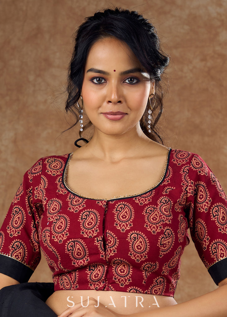 Ambi Ajrakh allure : Traditional maroon blouse featuring gota work details for a truly eye catching look