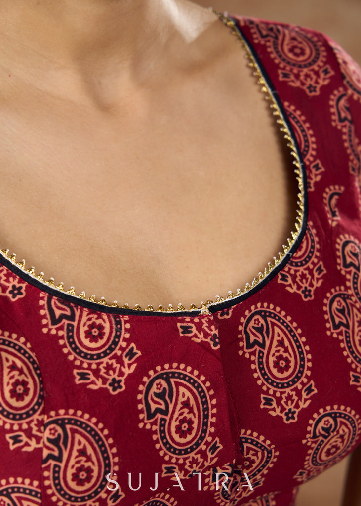 Ambi Ajrakh allure : Traditional maroon blouse featuring gota work details for a truly eye catching look