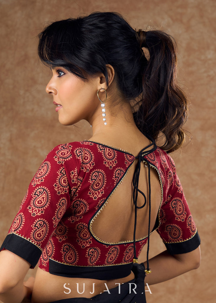 Ambi Ajrakh allure : Traditional maroon blouse featuring gota work details for a truly eye catching look