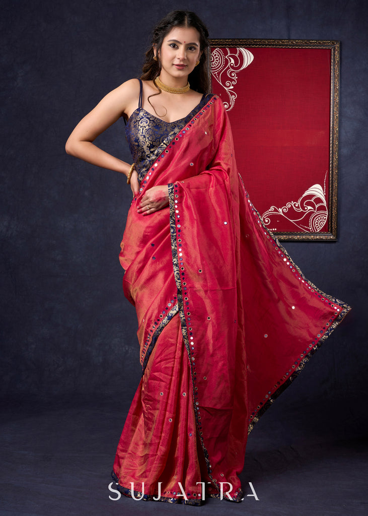 Mesmerizing Tissue Saree with all-over mirror work detailing highlighted with Banarasi Border