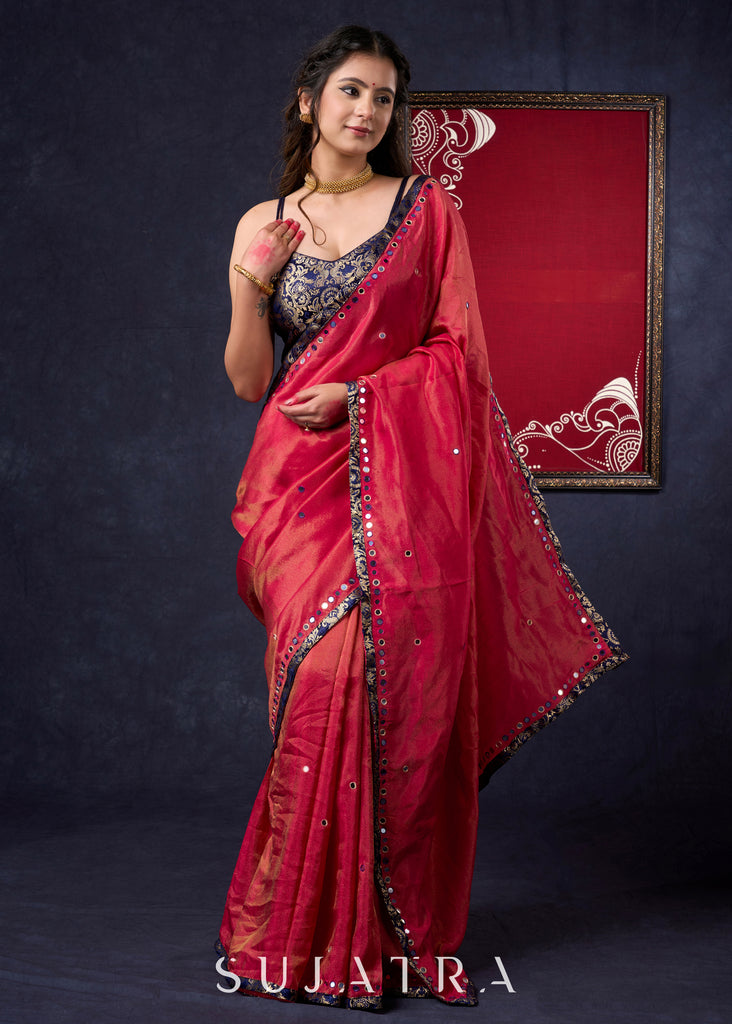 Mesmerizing Tissue Saree with all-over mirror work detailing highlighted with Banarasi Border