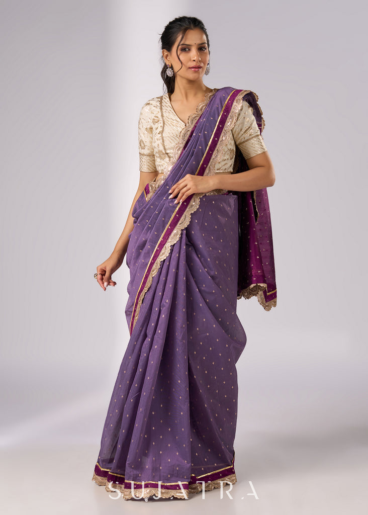 Purple chanderi saree with golden border and zari motifs