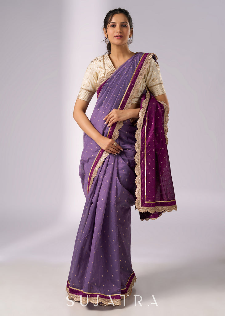 Purple chanderi saree with golden border and zari motifs