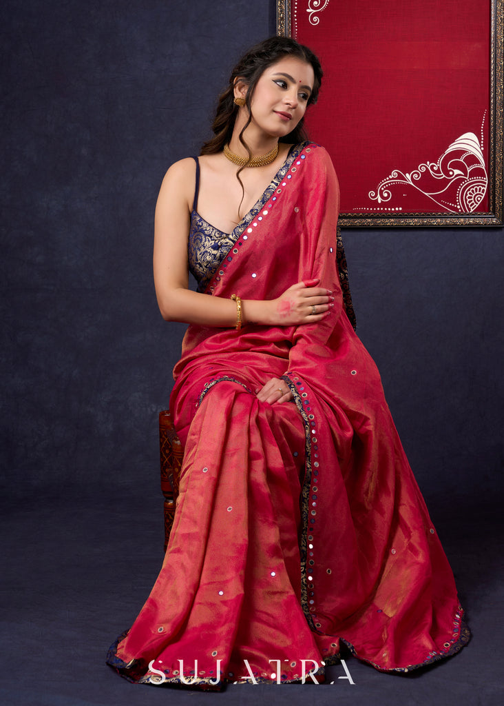 Mesmerizing Tissue Saree with all-over mirror work detailing highlighted with Banarasi Border