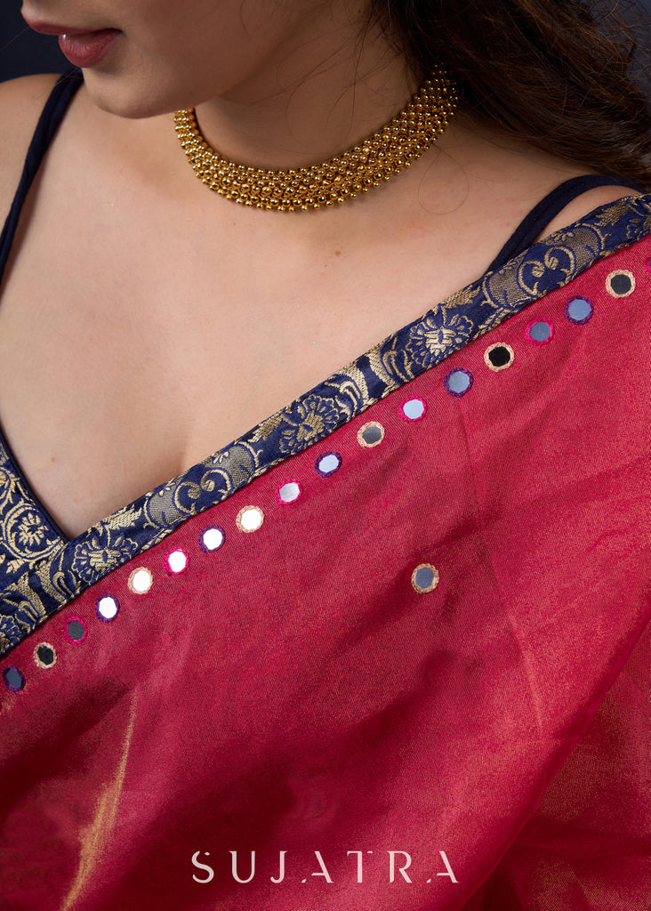 Mesmerizing Tissue Saree with all-over mirror work detailing highlighted with Banarasi Border